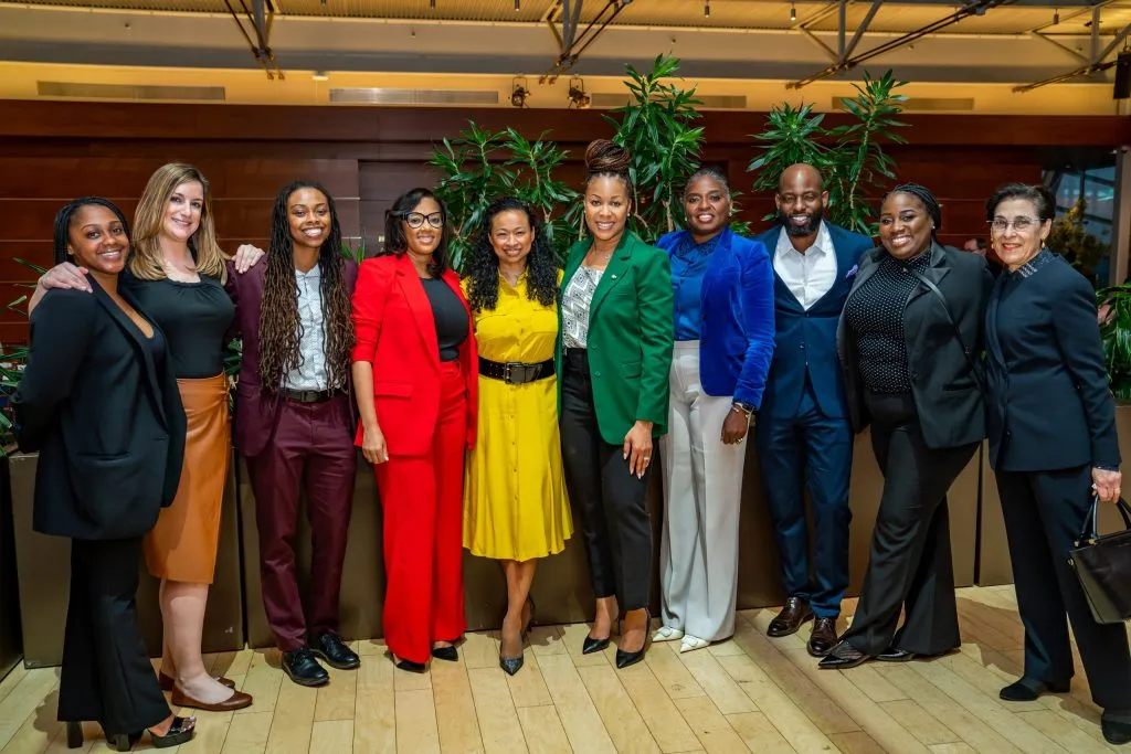 The team and Comcast's Dalila Wilson-Scott at Dinner with a Decision Maker